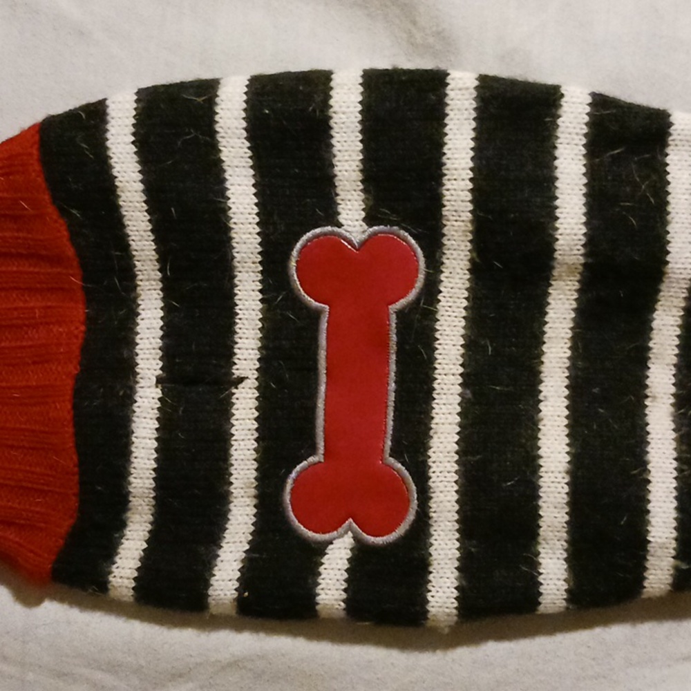 Dog sweater with Red bone in front
